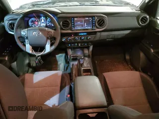 2023 Toyota Tacoma SR z VIN 3TMCZ5AN0PM651386, wystawiony jako Copart lot #51158185 z przebiegiem 23 642 mil mil oraz Szkoda całkowita • Salvage title. Historia ofert i sprzedaży dostępna na DreamBid. Obrazek 8.