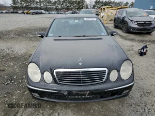 2005 Mercedes-Benz E 5.0L with VIN WDBUF70J45A645154, listed as a Copart auction lot 82883524 with 134,088 mi miles and Salvage Title. Bid and sale history available at carsss.com. Image 5.