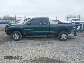 2000 Dodge Dakota SLT with VIN 1B7GG22X3YS508480, listed as a IAAI auction lot 41900645 with 105,652 mi miles and . Bid and sale history available at carsss.com. Image 14.