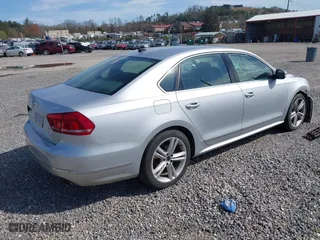 2013 Volkswagen Passat SEL Premium with VIN 1VWCM7A37DC024252, listed as a IAAI auction lot 41944978 with 168,616 mi miles. Bid and sale history available at carsss.com. Image 4.