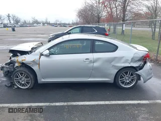 2005 Scion tC with VIN JTKDE177150001329, listed as a IAAI auction lot 41952901 with 143,223 mi miles. Bid and sale history available at carsss.com. Image 14.