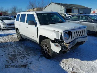2015 Jeep Patriot High Altitude with VIN 1C4NJRAB4FD381232, listed as a IAAI auction lot 41289384 with 121,581 mi miles. Bid and sale history available at carsss.com. Image 1.