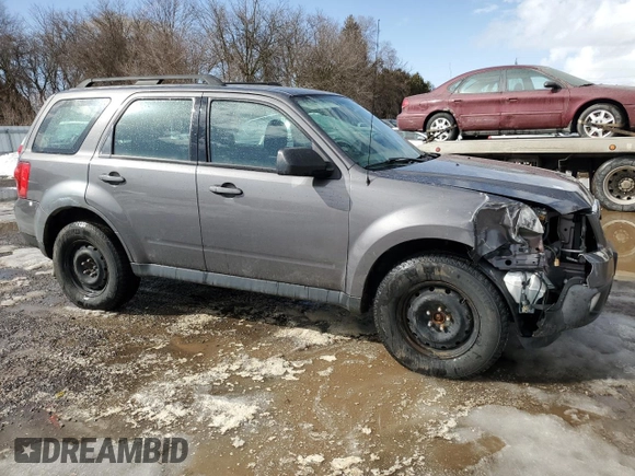 2011 Mazda Tribute Touring with VIN 4F2CY0C75BKM03624, listed as a Copart auction lot 47838305 with 188,952 mi miles and Salvage Title. Bid and sale history available at carsss.com. Image 4.