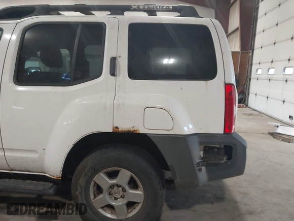 2007 Nissan Xterra SE z VIN 5N1AN08WX7C504137, wystawiony jako IAAI lot #42555326 z przebiegiem 176 908 mil mil oraz . Historia ofert i sprzedaży dostępna na DreamBid. Obrazek 6.