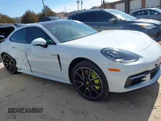 2018 Porsche Panamera 4 E-Hybrid z VIN WP0AE2A73JL129993, wystawiony jako IAAI lot #41602216 z przebiegiem 53 426 mil mil oraz . Historia ofert i sprzedaży dostępna na DreamBid. Obrazek 13.