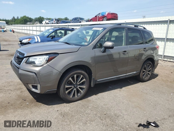 2017 Subaru Forester Touring with VIN JF2SJGWC9HH402713, listed as a Copart auction lot 62257345 with 128,903 mi miles and Salvage title. Bid and sale history available at DreamBid. Image 1.