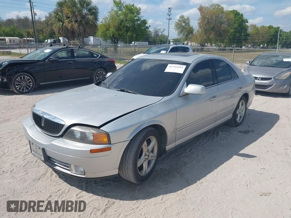 2000 Lincoln LS with VIN 1LNHM87A4YY886613, listed as a IAAI auction lot 41793515 with 144,061 mi miles. Bid and sale history available at carsss.com. Image 2.