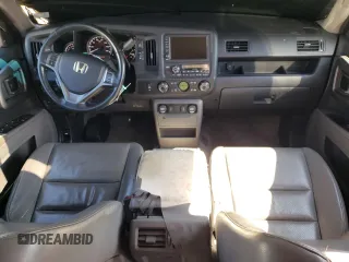 2011 Honda Ridgeline RTL with VIN 5FPYK1F51BB007802, listed as a Copart auction lot 63261935 with 397,803 mi miles and Clean title. Bid and sale history available at DreamBid. Image 8.