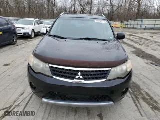 2009 Mitsubishi Outlander XLS with VIN JA4MT41X19Z012382, listed as a Copart auction lot 58723154 with 110,509 mi miles and Salvage Title. Bid and sale history available at carsss.com. Image 5.