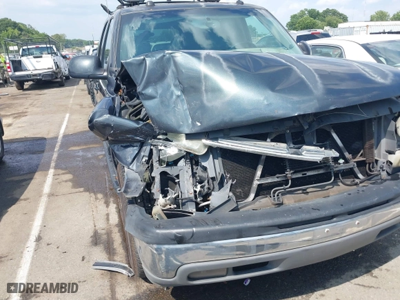 2004 Chevrolet Tahoe LT with VIN 1GNEC13Z04J134981, listed as a IAAI auction lot 39886652 with 244,056 mi miles. Bid and sale history available at carsss.com. Image 6.