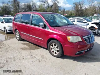 2012 Chrysler Town & Country Touring-L with VIN 2C4RC1CG6CR144174, listed as a IAAI auction lot 42003682 with 172,453 mi miles. Bid and sale history available at carsss.com. Image 1.
