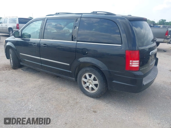 2010 Chrysler Town & Country Touring with VIN 2A4RR5D13AR155611, listed as a IAAI auction lot 42094894 with 132,966 mi miles. Bid and sale history available at carsss.com. Image 3.
