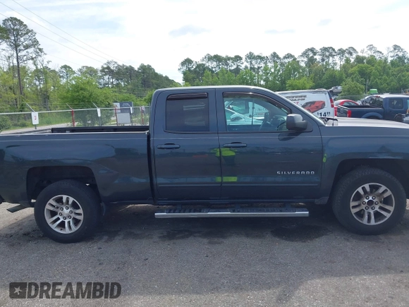 2017 Chevrolet Silverado 1500 LT with VIN 1GCRCREC4HZ298856, listed as a IAAI auction lot 42102225 with 147,501 mi miles and . Bid and sale history available at DreamBid. Image 13.
