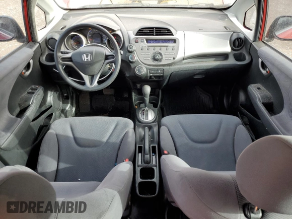2009 Honda Fit with VIN JHMGE882X9S014265, listed as a Copart auction lot 51140695 with 130,809 mi miles and Salvage Title. Bid and sale history available at carsss.com. Image 8.