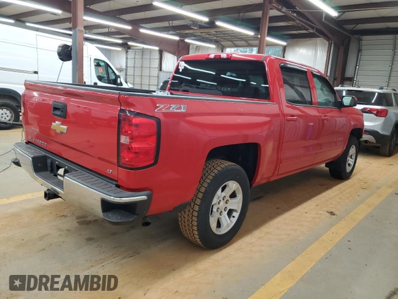 2015 Chevrolet Silverado 1500 LT with VIN 3GCUKREC0FG323049, listed as a Copart auction lot 52688605 with 107,903 mi miles and Salvage Title. Bid and sale history available at DreamBid. Image 3.