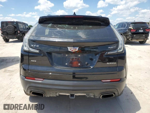 2021 Cadillac XT4 AWD Sport with VIN 1GYFZFR43MF054379, listed as a Copart auction lot 55338315 with 53,693 mi miles and Salvage title. Bid and sale history available at DreamBid. Image 6.