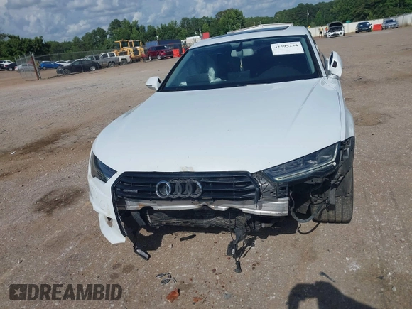 2016 Audi A7 Premium Plus with VIN WAUWGAFC2GN021696, listed as a IAAI auction lot 42595234 with 112,464 mi miles and . Bid and sale history available at DreamBid. Image 6.