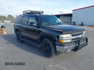 2004 Chevrolet Tahoe LT with VIN 1GNEC13ZX4J106072, listed as a IAAI auction lot 41703828 with 275,081 mi miles. Bid and sale history available at carsss.com. Image 1.
