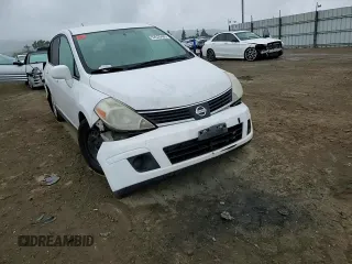 2007 Nissan Versa SL z VIN 3N1BC13E87L414432, wystawiony jako Copart lot #52630485 z przebiegiem 251 374 mil mil oraz Szkoda całkowita • Salvage title. Historia ofert i sprzedaży dostępna na DreamBid. Obrazek 11.