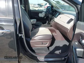 2015 Kia Sedona SX-L with VIN KNDME5C10F6033882, listed as a IAAI auction lot 41808805 with 81,936 mi miles and . Bid and sale history available at DreamBid. Image 5.