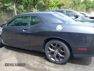 2018 Dodge Challenger SXT z VIN 2C3CDZAG1JH143140, wystawiony jako IAAI lot #42289674 z przebiegiem 79 764 mil mil oraz . Historia ofert i sprzedaży dostępna na DreamBid. Obrazek 15.