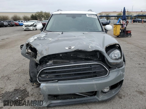 2017 MINI Countryman Cooper with VIN WMZYS7C31H3E06457, listed as a Copart auction lot 49351315 with 77,461 mi miles and Salvage title. Bid and sale history available at DreamBid. Image 5.
