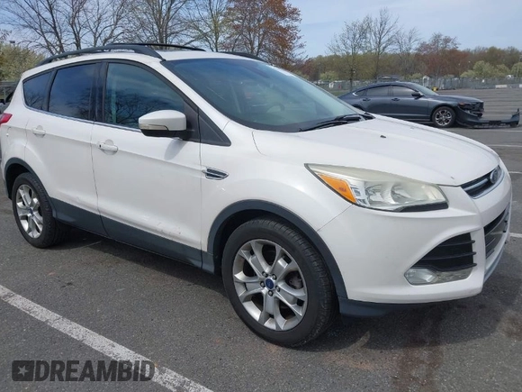 2013 Ford Escape SEL with VIN 1FMCU9HXXDUD82944, listed as a IAAI auction lot 42079667 with 97,304 mi miles. Bid and sale history available at carsss.com. Image 1.