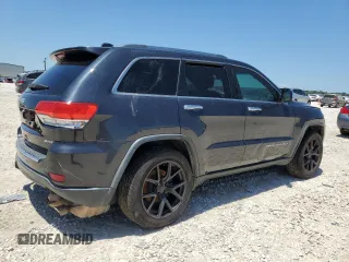 2014 Jeep Grand Cherokee Limited with VIN 1C4RJEBT9EC274120, listed as a Copart auction lot 54722064 with 148,684 mi miles and Salvage Title. Bid and sale history available at DreamBid. Image 3.