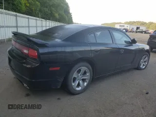2013 Dodge Charger SE with VIN 2C3CDXBG9DH512172, listed as a Copart auction lot 60943214 with 125,163 mi miles and Salvage Title. Bid and sale history available at DreamBid. Image 3.