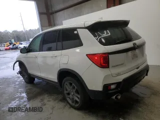 2023 Honda Passport EX-L with VIN 5FNYF8H56PB008485, listed as a Copart auction lot 47852225 with 52,543 mi miles and Salvage Title. Bid and sale history available at carsss.com. Image 2.