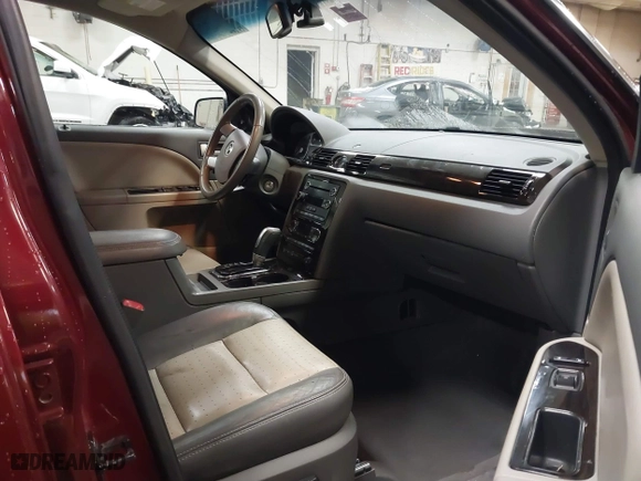 2008 Mercury Sable Premier with VIN 1MEHM42W08G608456, listed as a IAAI auction lot 41601619 with 137,936 mi miles. Bid and sale history available at carsss.com. Image 5.