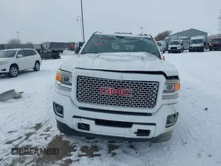 2015 GMC Sierra 2500HD available WiFi Denali with VIN 1GT120E88FF680538, listed as a IAAI auction lot 41571684 with 125,147 mi miles. Bid and sale history available at carsss.com. Image 12.