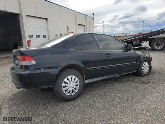 2000 Honda Civic EX with VIN 1HGEJ8243YL128682, listed as a Copart auction lot 52088565 with 0 mi miles and Salvage Title. Bid and sale history available at carsss.com. Image 3.