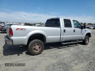 2004 Ford F-350 XL with VIN 1FTSW31P04EC44129, listed as a Copart auction lot 63519165 with 205,411 mi miles and Salvage title. Bid and sale history available at DreamBid. Image 3.