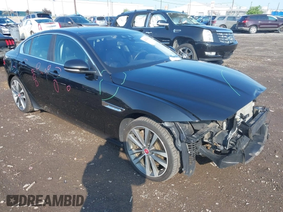 2017 Jaguar XE 35t Prestige z VIN SAJAK4BV6HA974264, wystawiony jako IAAI lot #42474124 z przebiegiem 92 037 mil mil oraz . Historia ofert i sprzedaży dostępna na DreamBid. Obrazek 1.