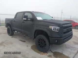 2016 Toyota Tundra 4WD Truck LTD with VIN 5TFHW5F11GX560903, listed as a IAAI auction lot 41883485 with 133,059 mi miles. Bid and sale history available at carsss.com. Image 1.
