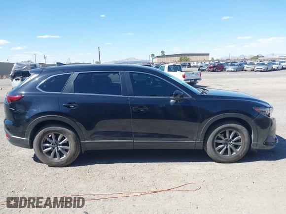 2018 Mazda CX-9 Sport with VIN JM3TCABY8J0223750, listed as a IAAI auction lot 42155429 with 133,543 mi miles and . Bid and sale history available at DreamBid. Image 14.