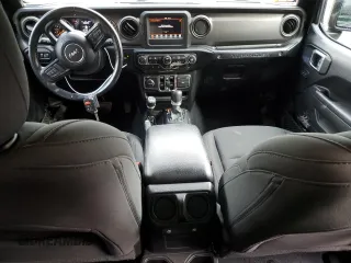 2022 Jeep Wrangler Unlimited High Tide with VIN 1C4HJXDG0NW180276, listed as a Copart auction lot 75798804 with 30,696 mi miles and Salvage Title. Bid and sale history available at DreamBid. Image 8.