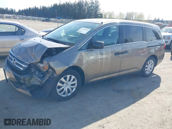 2013 Honda Odyssey LX z VIN 5FNRL5H29DB055166, wystawiony jako IAAI lot #41965037 z przebiegiem 122 470 mil mil oraz . Historia ofert i sprzedaży dostępna na DreamBid. Obrazek 17.
