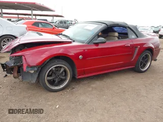 2001 Ford Mustang Deluxe with VIN 1FAFP44491F134522, listed as a IAAI auction lot 41814040 with 181,954 mi miles. Bid and sale history available at carsss.com. Image 2.