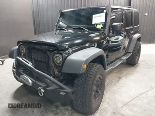 2015 Jeep Wrangler Unlimited Willys Wheeler with VIN 1C4BJWDG1FL749803, listed as a IAAI auction lot 41995132 with 156,595 mi miles and . Bid and sale history available at DreamBid. Image 19.