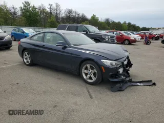 2014 BMW 4 Series 428i xDrive with VIN WBA3N5C58EK196233, listed as a Copart auction lot 58775715 with 131,340 mi miles and Salvage title. Bid and sale history available at DreamBid. Image 4.