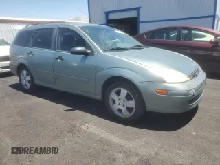 2004 Ford Focus SE with VIN 1FAFP36384W191801, listed as a Copart auction lot 63661465 with 144,226 mi miles and Salvage title. Bid and sale history available at DreamBid. Image 4.