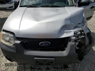 2006 Ford Escape Hybrid z VIN 1FMYU96H56KA48353, wystawiony jako Copart lot #63620365 z przebiegiem 165 223 mil mil oraz Szkoda całkowita • Salvage title. Historia ofert i sprzedaży dostępna na DreamBid. Obrazek 12.