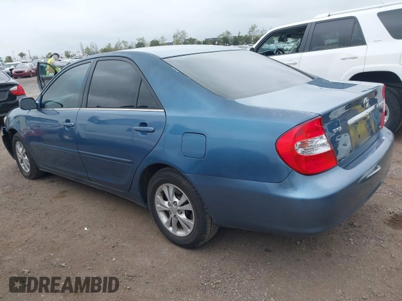 2004 Toyota Camry LE with VIN 4T1BF32K54U572537, listed as a IAAI auction lot 41850322 with 167,076 mi miles and . Bid and sale history available at DreamBid. Image 3.
