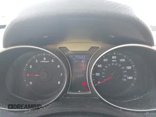 2012 Hyundai Veloster w/Gray Int z VIN KMHTC6AD1CU081754, wystawiony jako IAAI lot #42421889 z przebiegiem 99 593 mil mil oraz . Historia ofert i sprzedaży dostępna na DreamBid. Obrazek 7.