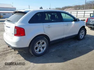 2013 Ford Edge SEL with VIN 2FMDK3JC7DBA11616, listed as a IAAI auction lot 41782593 with 184,242 mi miles. Bid and sale history available at carsss.com. Image 4.