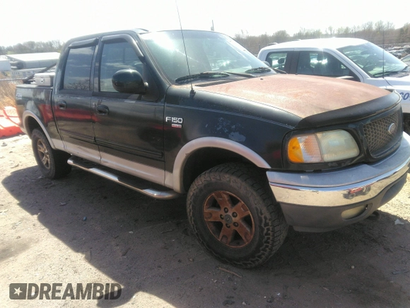 2002 Ford F-150 XLT with VIN 1FTRW08L12KC44008, listed as a IAAI auction lot 41811120 with 306,235 mi miles. Bid and sale history available at carsss.com. Image 1.
