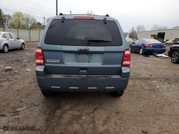 2010 Ford Escape XLT with VIN 1FMCU0D74AKD01784, listed as a Copart auction lot 52857725 with 119,448 mi miles and Salvage Title. Bid and sale history available at carsss.com. Image 6.