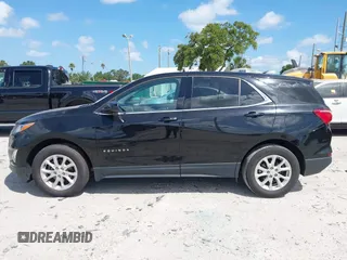 2020 Chevrolet Equinox LT z VIN 2GNAXKEV2L6234577, wystawiony jako IAAI lot #42186081 z przebiegiem 99 795 mil mil oraz . Historia ofert i sprzedaży dostępna na DreamBid. Obrazek 14.